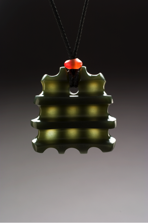 Another Peter Schilling pendant carved out of Wyoming olive jade.