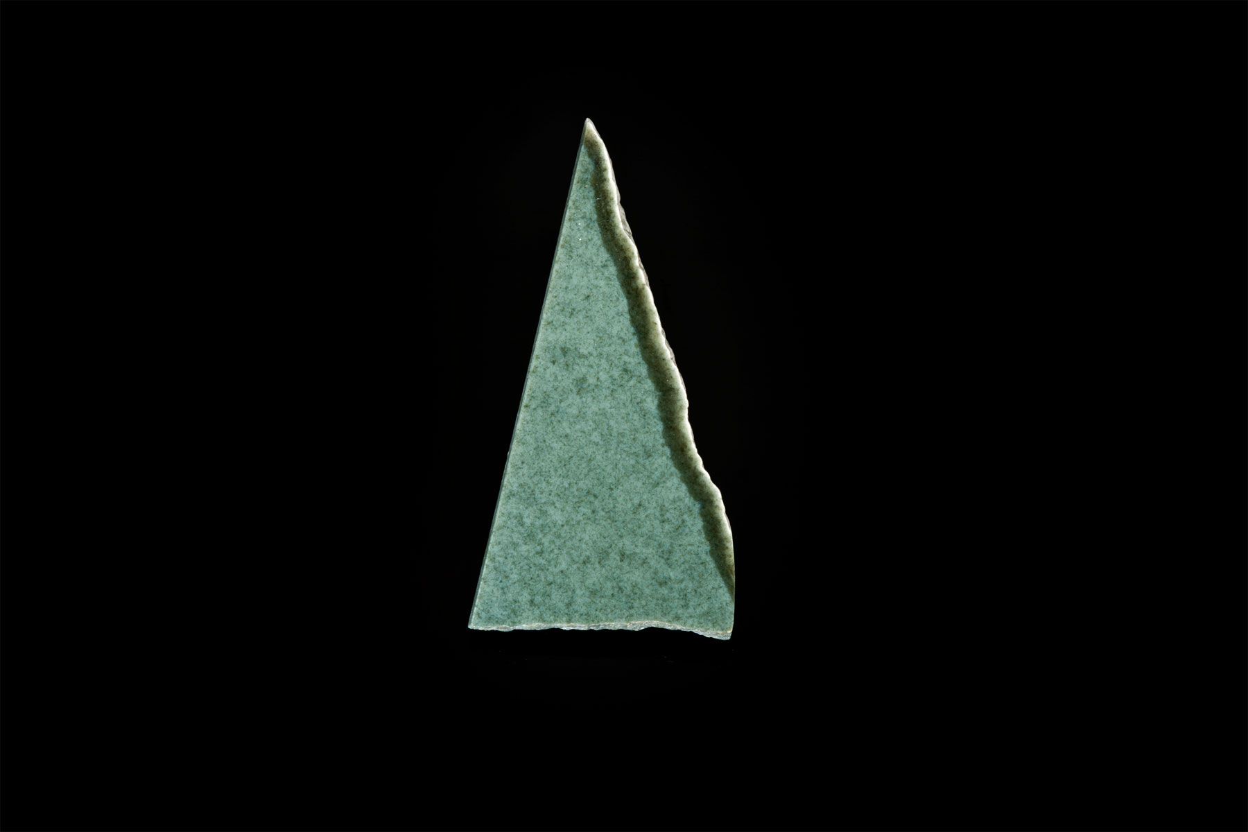 Above is a small slice typical of Wyoming sage green jade that is easily polished. (Photo: Robert Weldon)