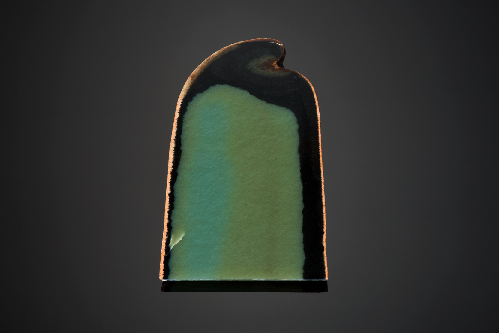 Above, a similar but distinct piece of Bull Canyon Wyoming jade that I purchased as jasper at the 1990 Tucson Gem and Mineral Show. (Photo: Robert Weldon)
