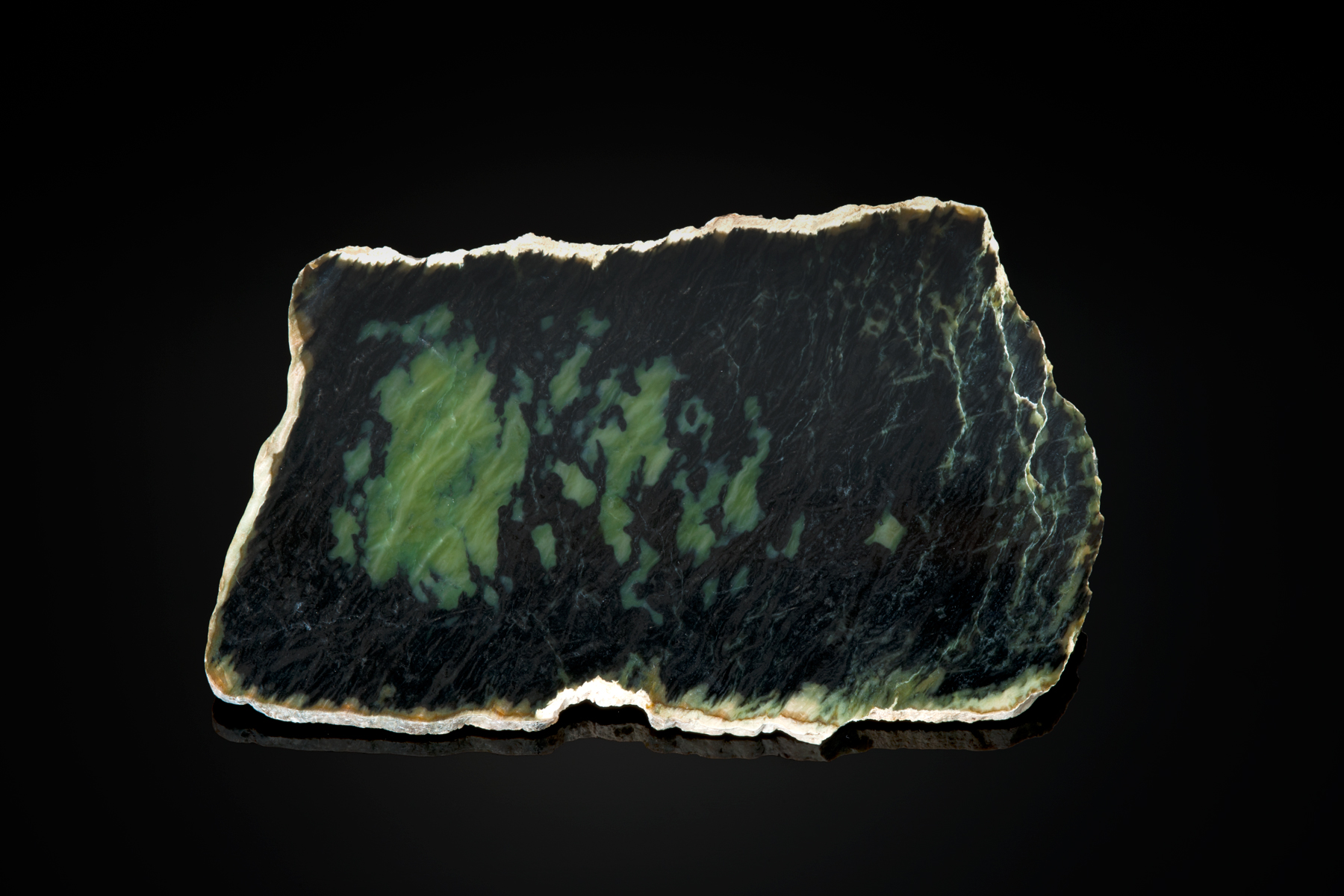 A piece of patterned jade is shown above that displays best in transmitted light. (Photo: Robert Weldon)