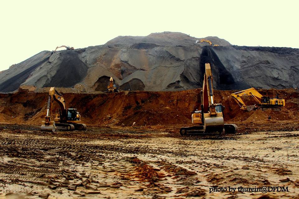 Construction machinery digs through fresh earth at Hpakant, Kachin State. (Photo: DVB)