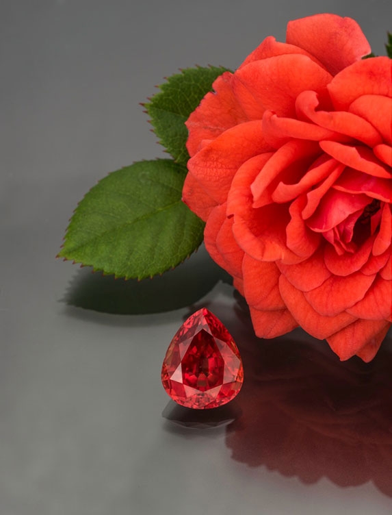 Pear-shaped 5.65-carat natural padparadscha sapphire from Malawi, 12.08 x 9.80 x 6.34 mm with AGL certificate. Photo: Mia Dixon
