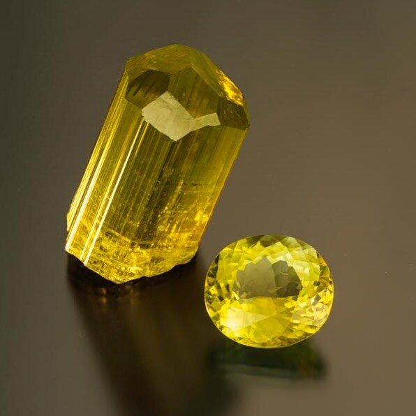 59.72 grams tourmaline crystal from the Democratic Republic of Congo and a 43.40 cts tourmaline from Mozambique #tourmaline #yellow #canary #gem #crystal #💛 #💎 #jewel #standout #finegems #dresstoimpress #sparkle #jewelrydesign #adornment #stilllife