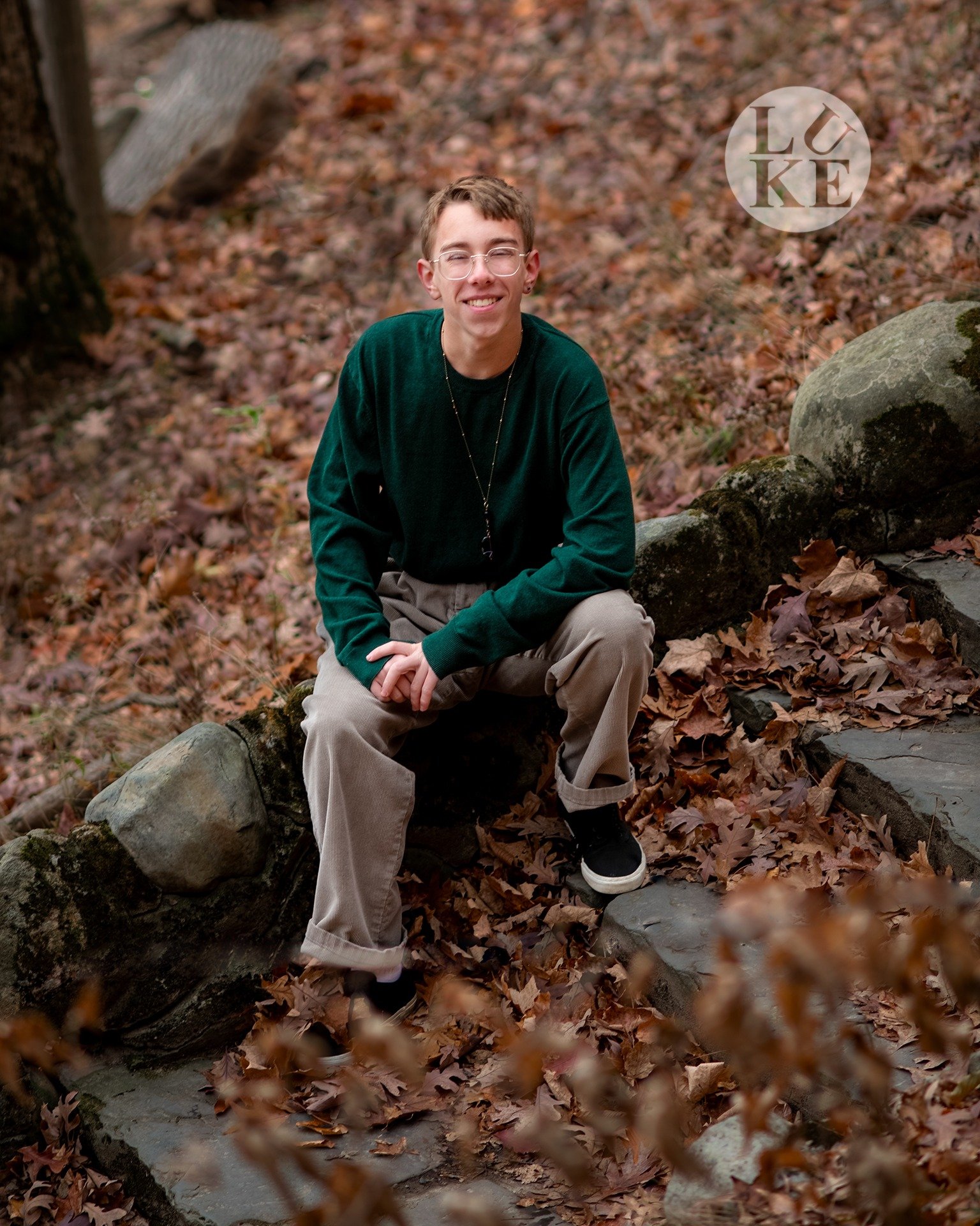 2nd Look: Liam (Fairport HS) it was my great idea to get up above Liam so I would have all the oak leaves behind him as a non-distracting background.  The color works as a great color contrast to the green sweater.

It was also my &quot;great&quot; i