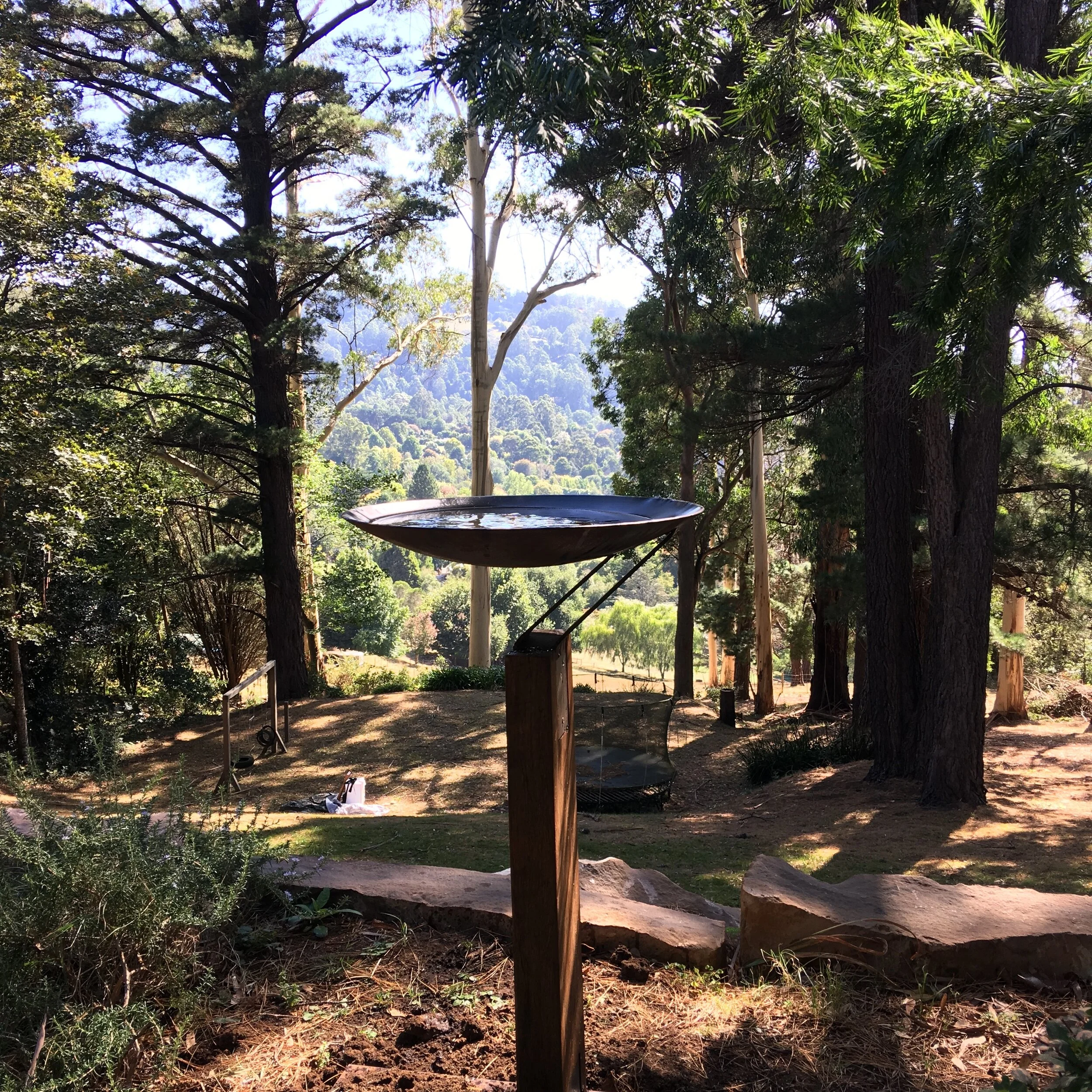 "Sand Wedge" bird bath on reclaimed timber base.