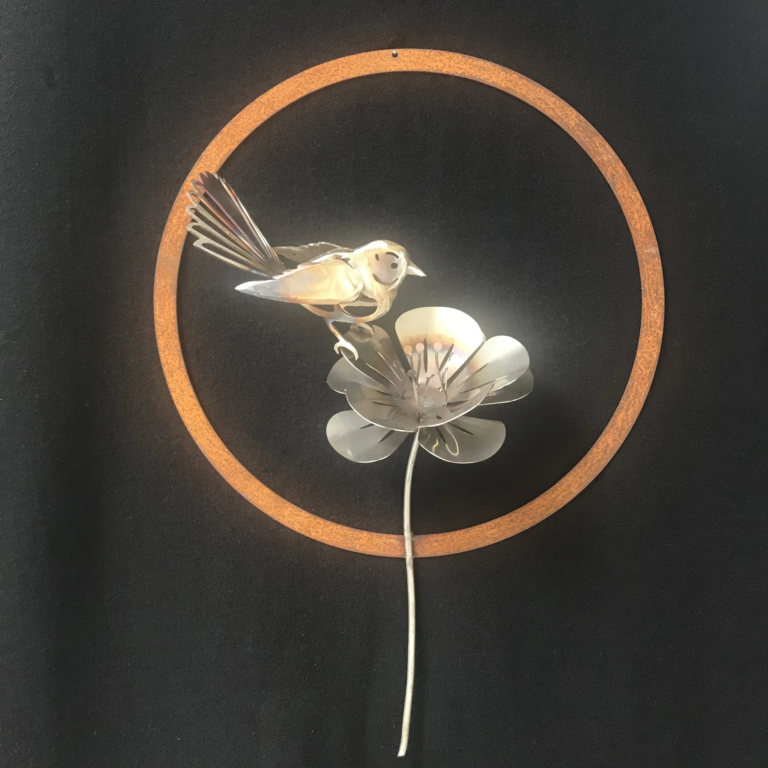 Fantail and flower wall piece by Grant Flather