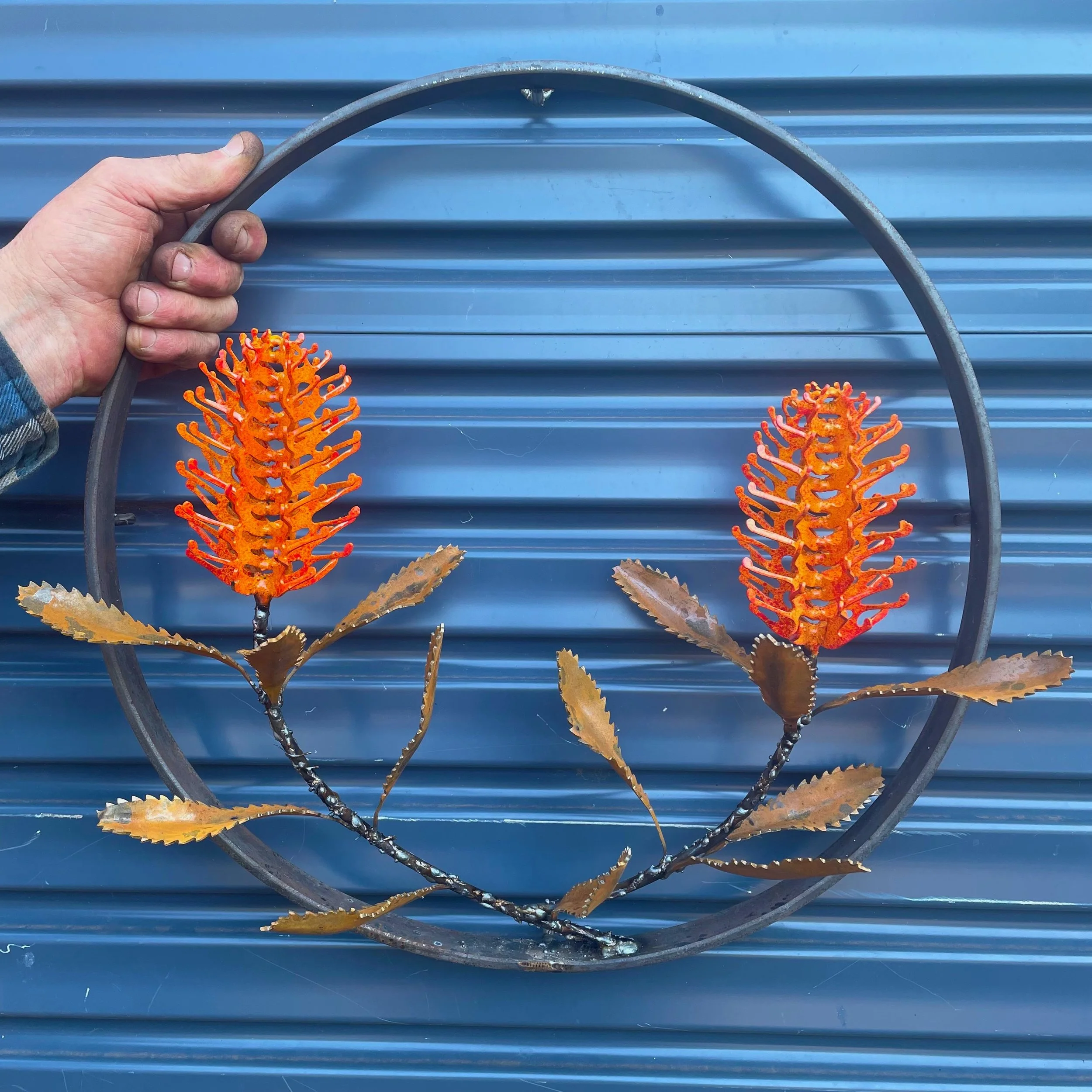   44cm.  In orange.  $550 