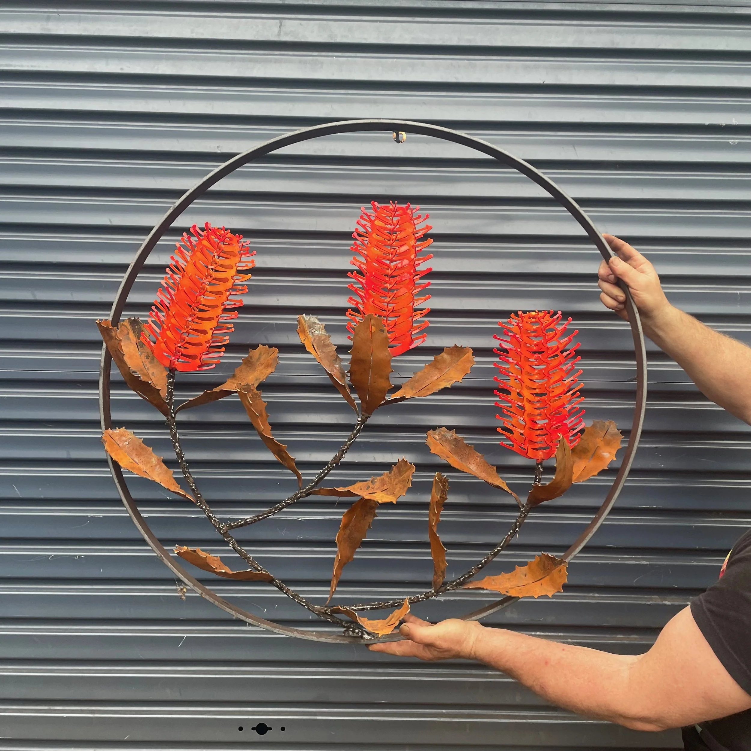 Triple medium Banksia wall sculpture in Orange by Grant Flather