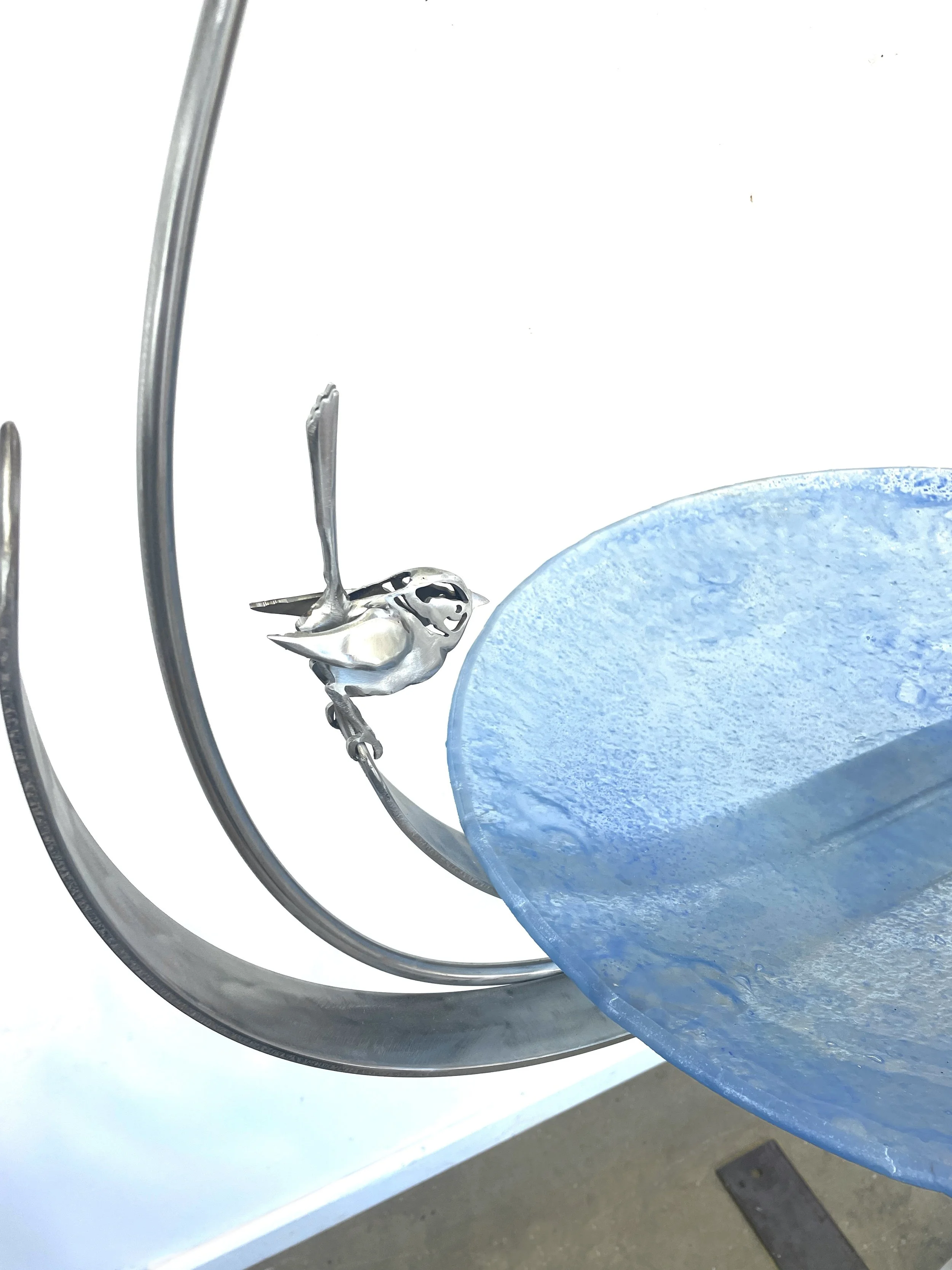  Glass and steel birdbath.  $1700 