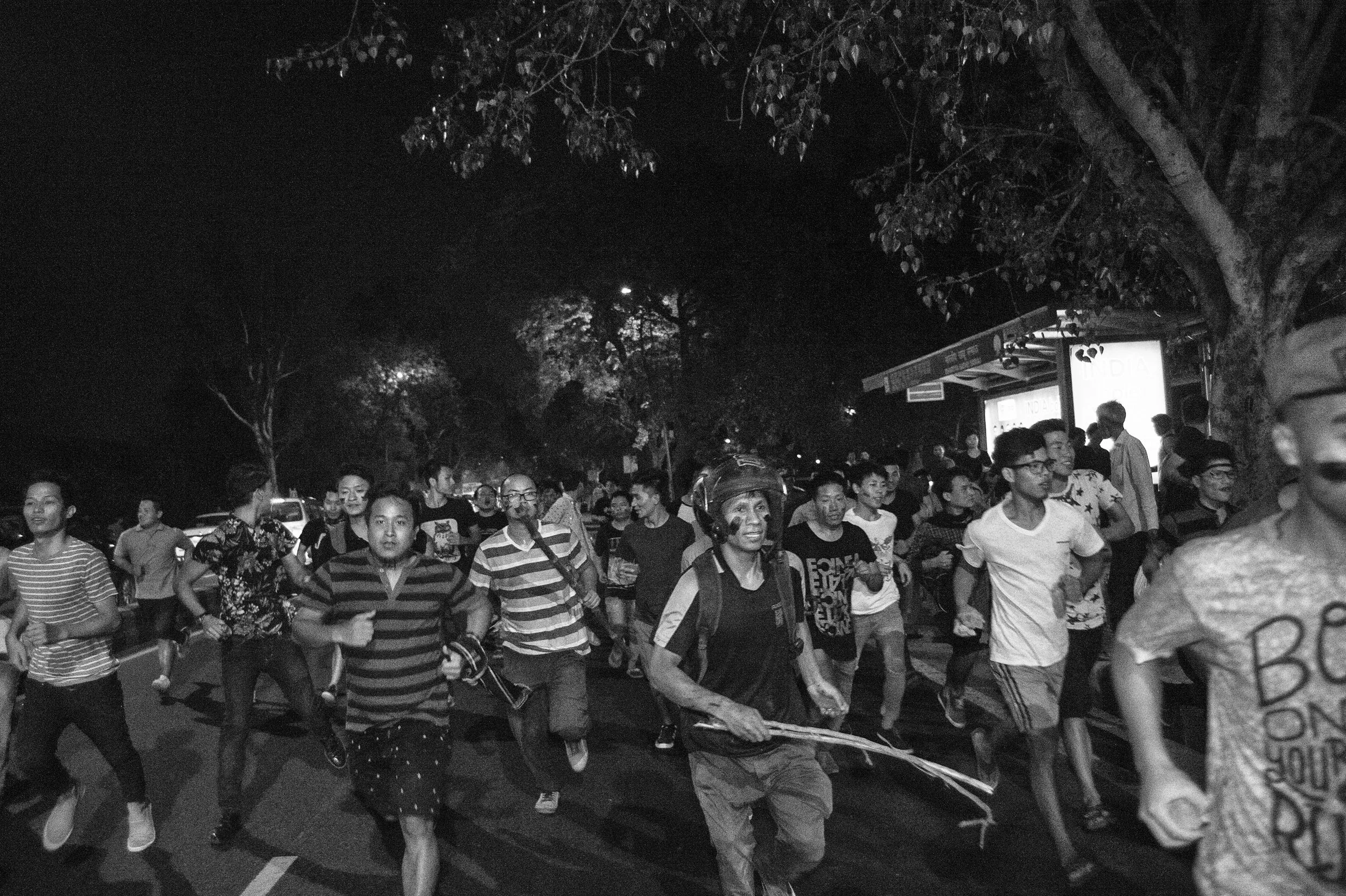 June,&nbsp;2016: Protesters from the hill districts of Manipur, run away from the police outside Manipur Bhavan in Delhi. The protest turned violent as the tug of war between the police and the protesters finally resulted in the Police charging the 