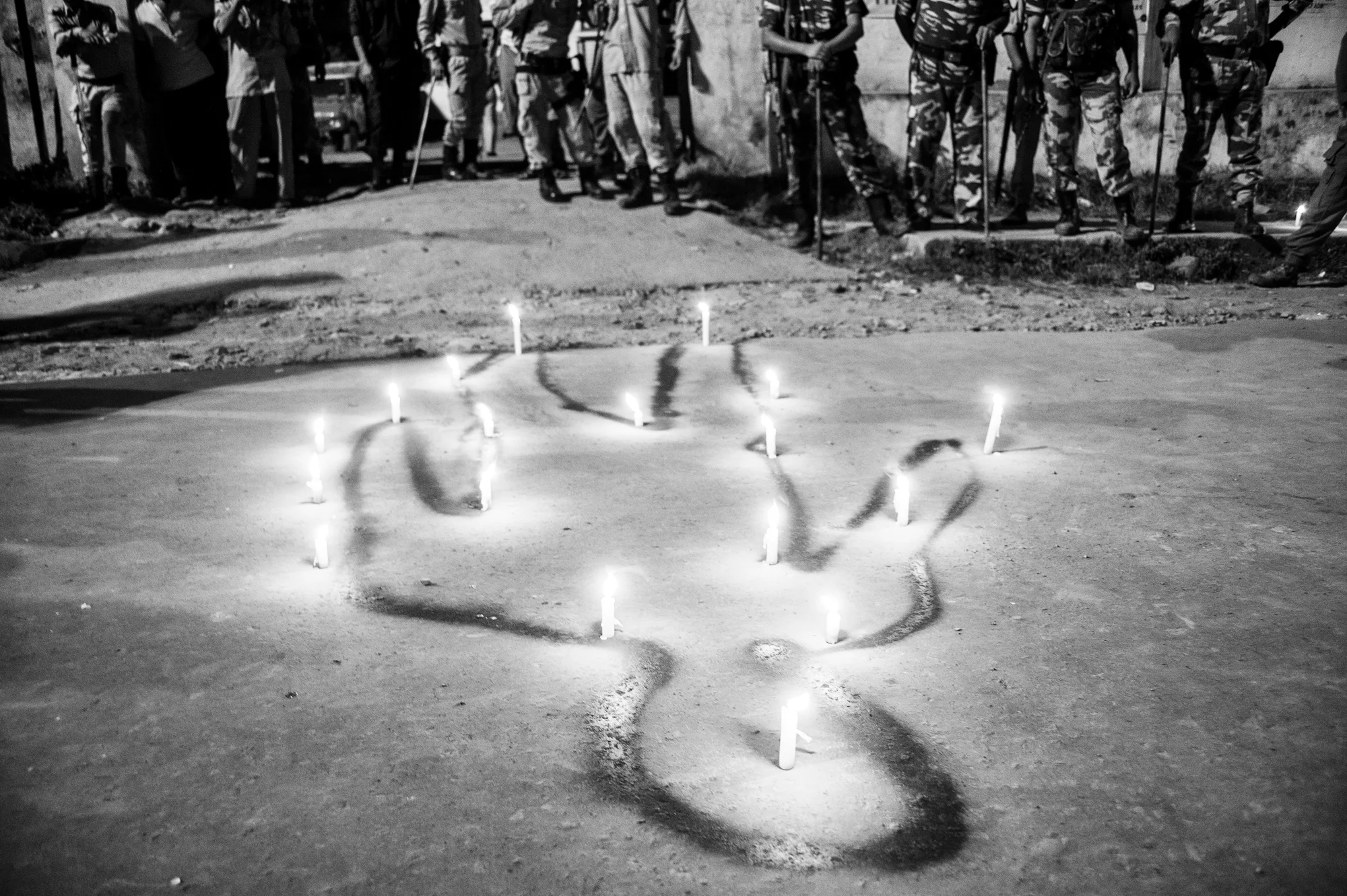 August 2016: Outside the Churachandpur Police station, protestors painted figures of the fallen in red with spray paint, lit candles and offered prayers.