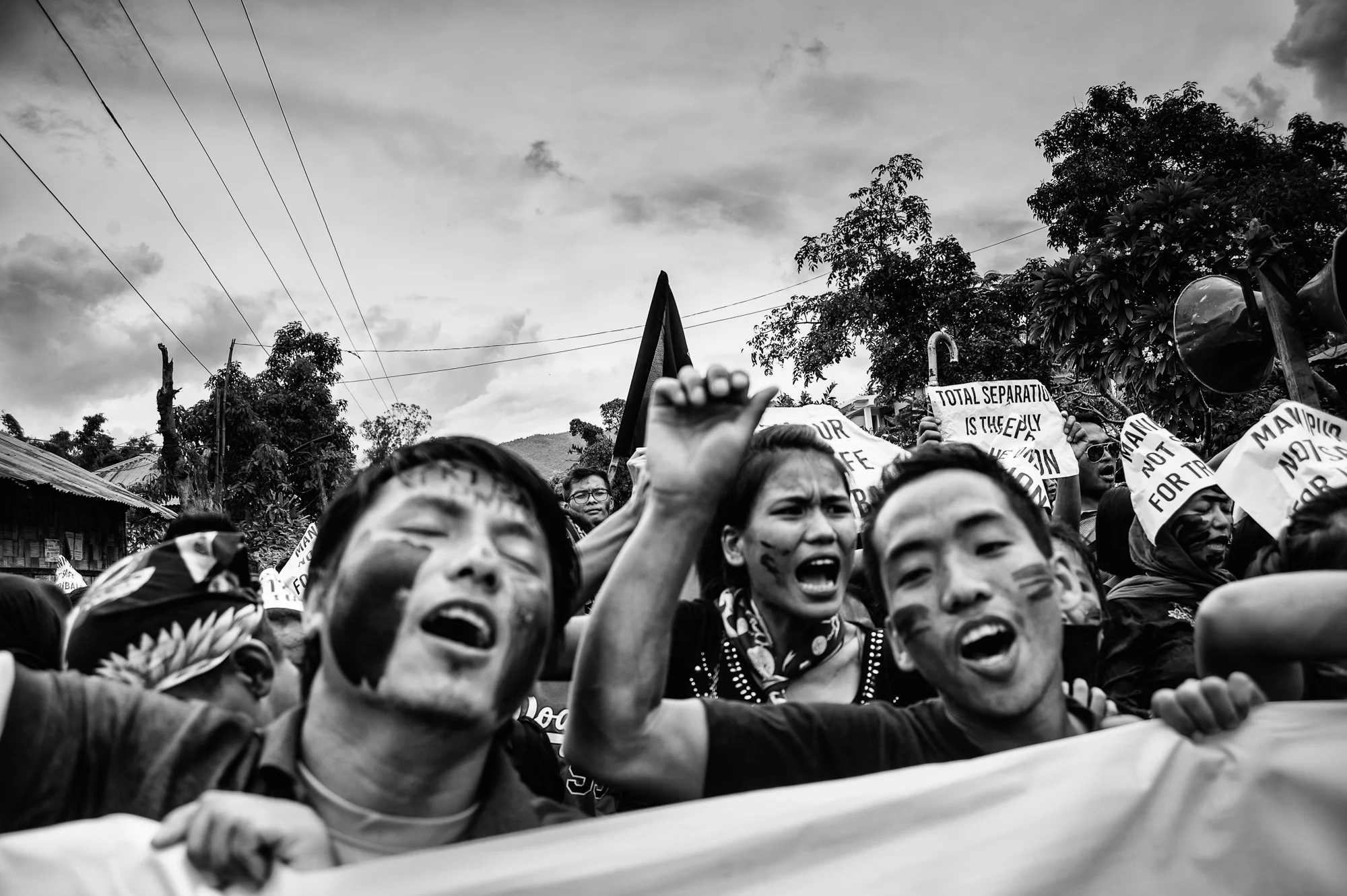 August 2016: Robert V. Zamminthang, one of the nine protesters who was shot in the head by the police in Churachandpur a year back, was a theology student, perhaps the reason why the first line of protesters were Grace Bible College students who led a march of more than 10,000 people in Churachandpur to Pumbuk, where a memorial honouring the dead has stood for a year.