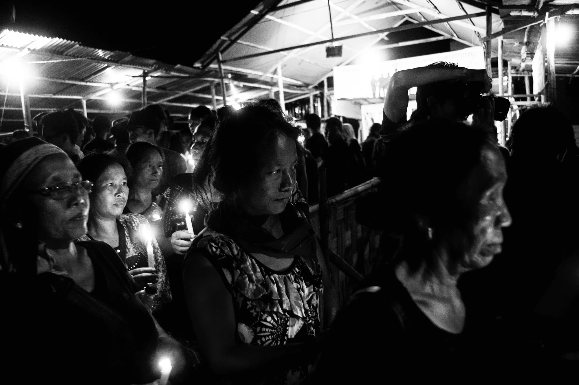 August 2016: Women gathered at Pumbuk where a memorial honouring the dead has stood for over a year on August 30 for a candle light vigil.