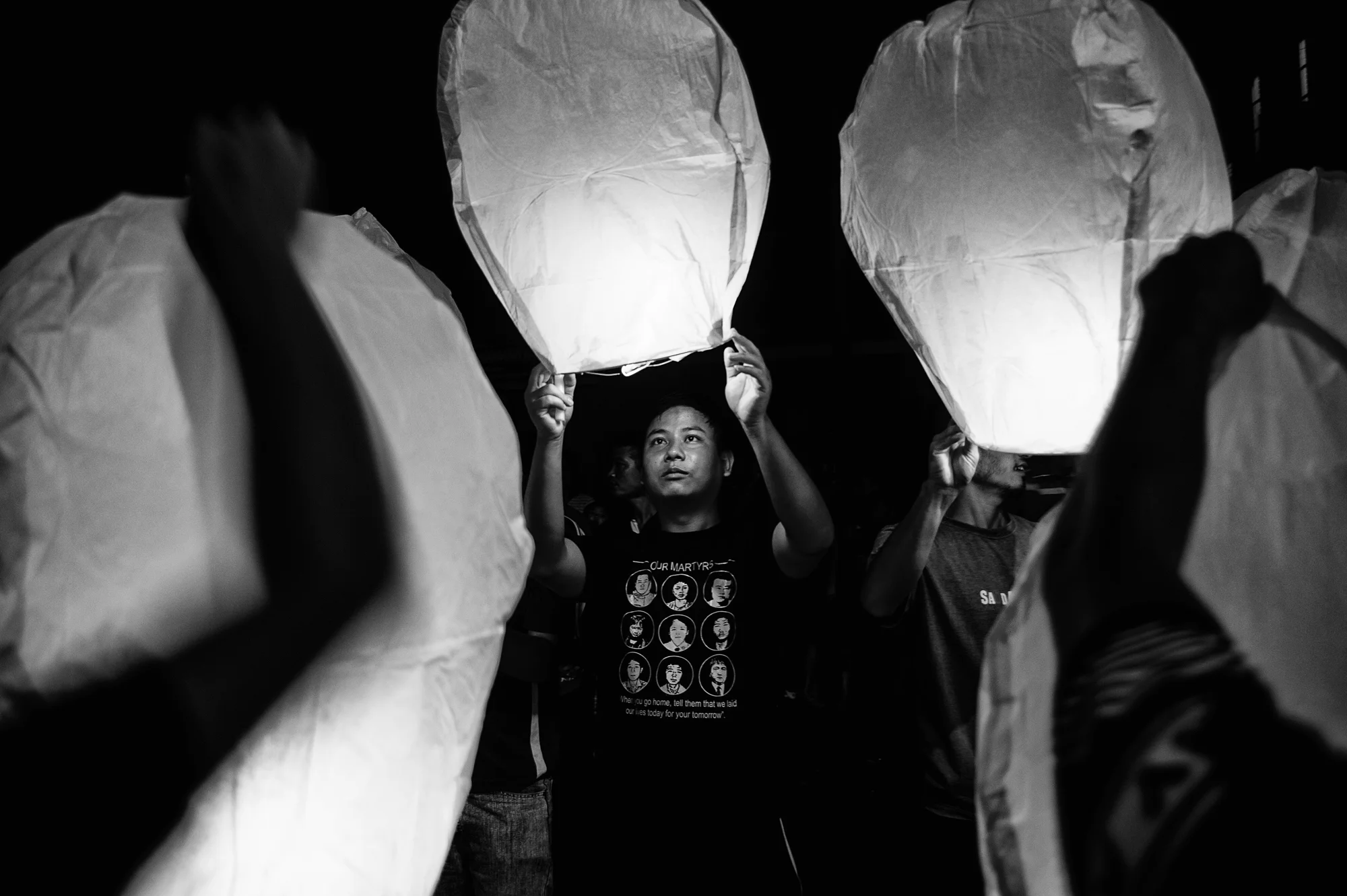 August 2016: On August 30 after the candle light vigil, a large gathering set afloat flying lanterns.
