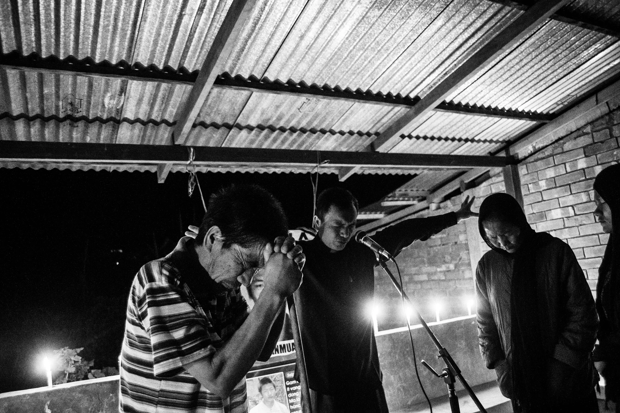 September 2016: At Pearsonmun, a little village in Churachandpur, a pastor prayed for the families of the dead.