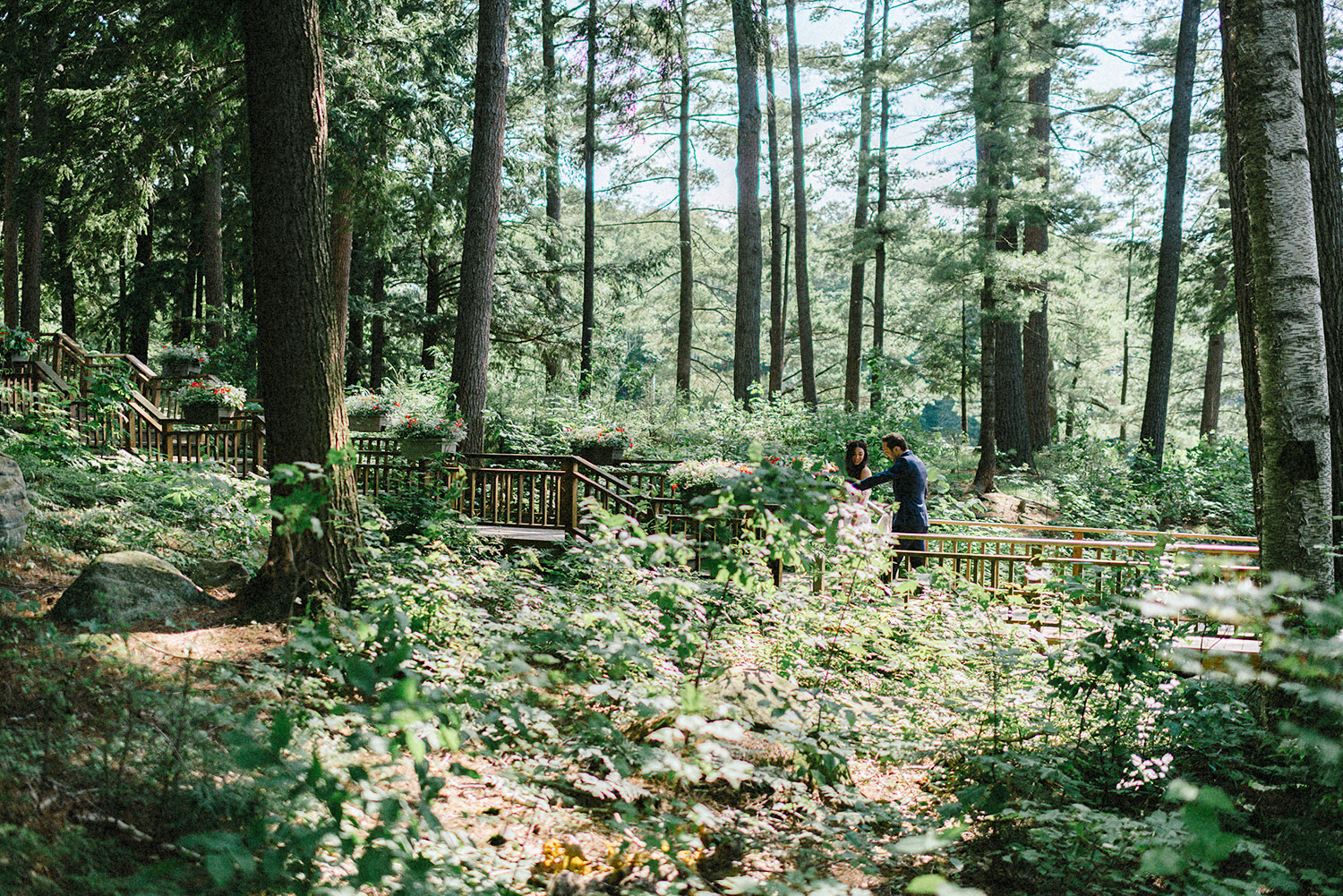 Muskoka-Cottage-Wedding-Photography-Photographer_Photojournalistic-Documentary-Wedding-Photography_Vintage-Bride-Lovers-Land-Dress_Rue-Des-Seins_Forest-Ceremony-Bride-and-Groom-Exit.jpg