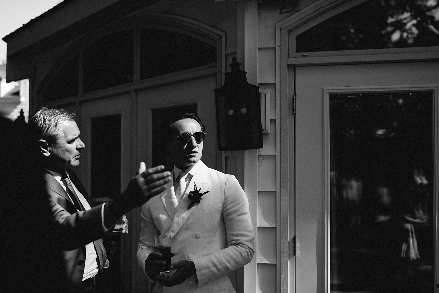 Muskoka-Cottage-Wedding-Photography-Photographer_Photojournalistic-Documentary-Wedding-Photography_Vintage-Bride-Lovers-Land-Dress_Rue-Des-Seins_Forest-Reception-Candid-Guest-BnW.jpg