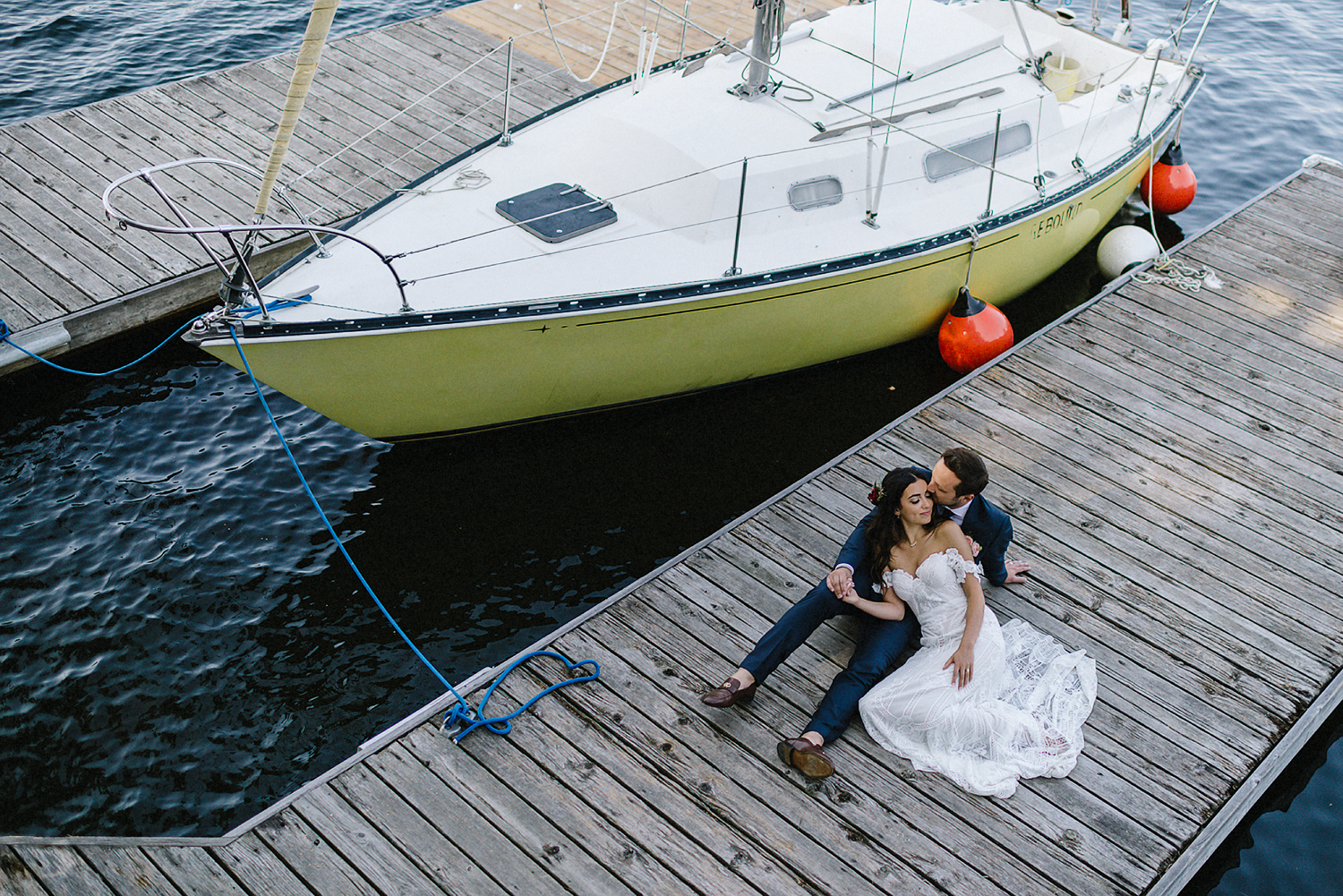 Muskoka-Cottage-Wedding-Photography-Photographer_Photojournalistic-Documentary-Wedding-Photography_Vintage-Bride-Lovers-Land-Dress_Rue-Des-Seins_Forest-Ceremony-Bride-and-Groom-Intimate-on-Sailboat.jpg