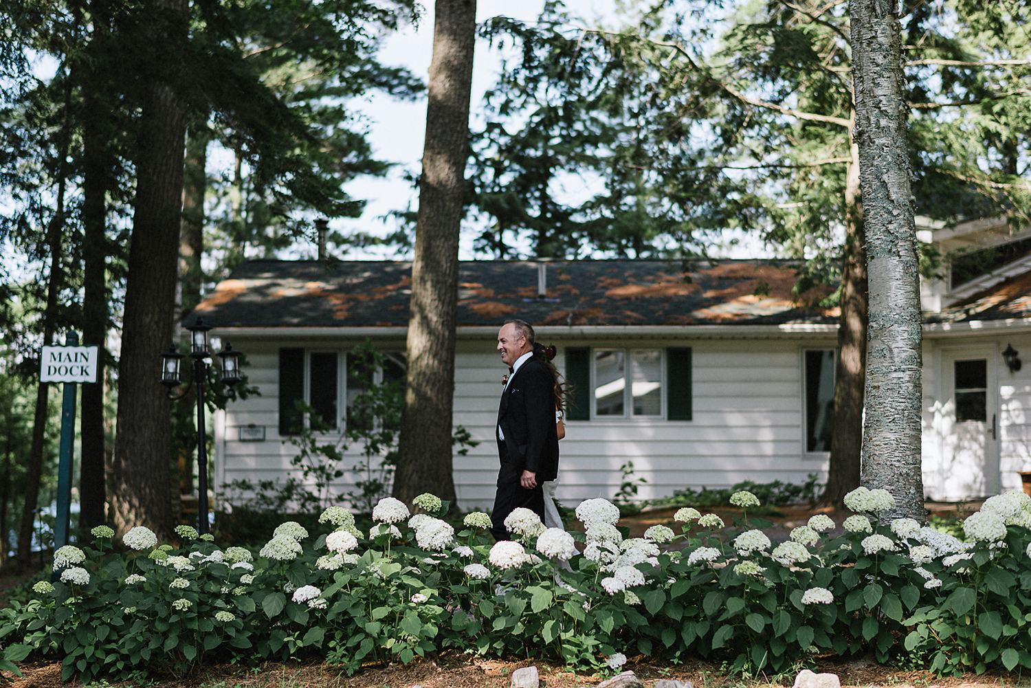 Muskoka-Cottage-Wedding-Photography-Photographer_Photojournalistic-Documentary-Wedding-Photography_Vintage-Bride-Lovers-Land-Dress_Rue-Des-Seins_Forest-Ceremony-Bride-and-father.jpg