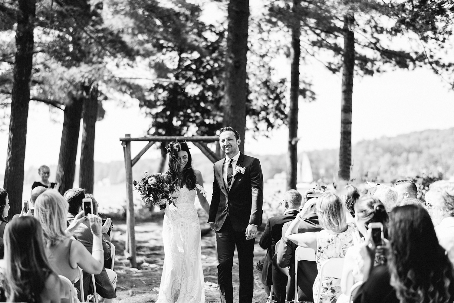 Muskoka-Cottage-Wedding-Photography-Photographer_Photojournalistic-Documentary-Wedding-Photography_Vintage-Bride-Lovers-Land-Dress_Bride-Groom-Exit-Forest-Ceremony.jpg