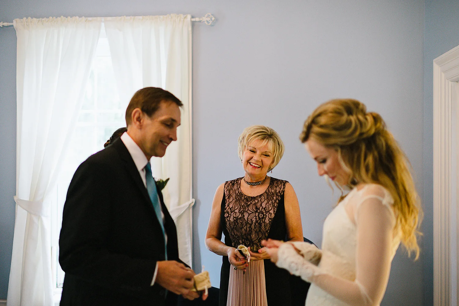 Best-Moody-Documentary-Wedding-Photography-Photojournalism-Vintage-Small-Town-Chapel-Wedding-Toronto-Ontario_Candid-Bride-and-Parents-candid-moment.jpg
