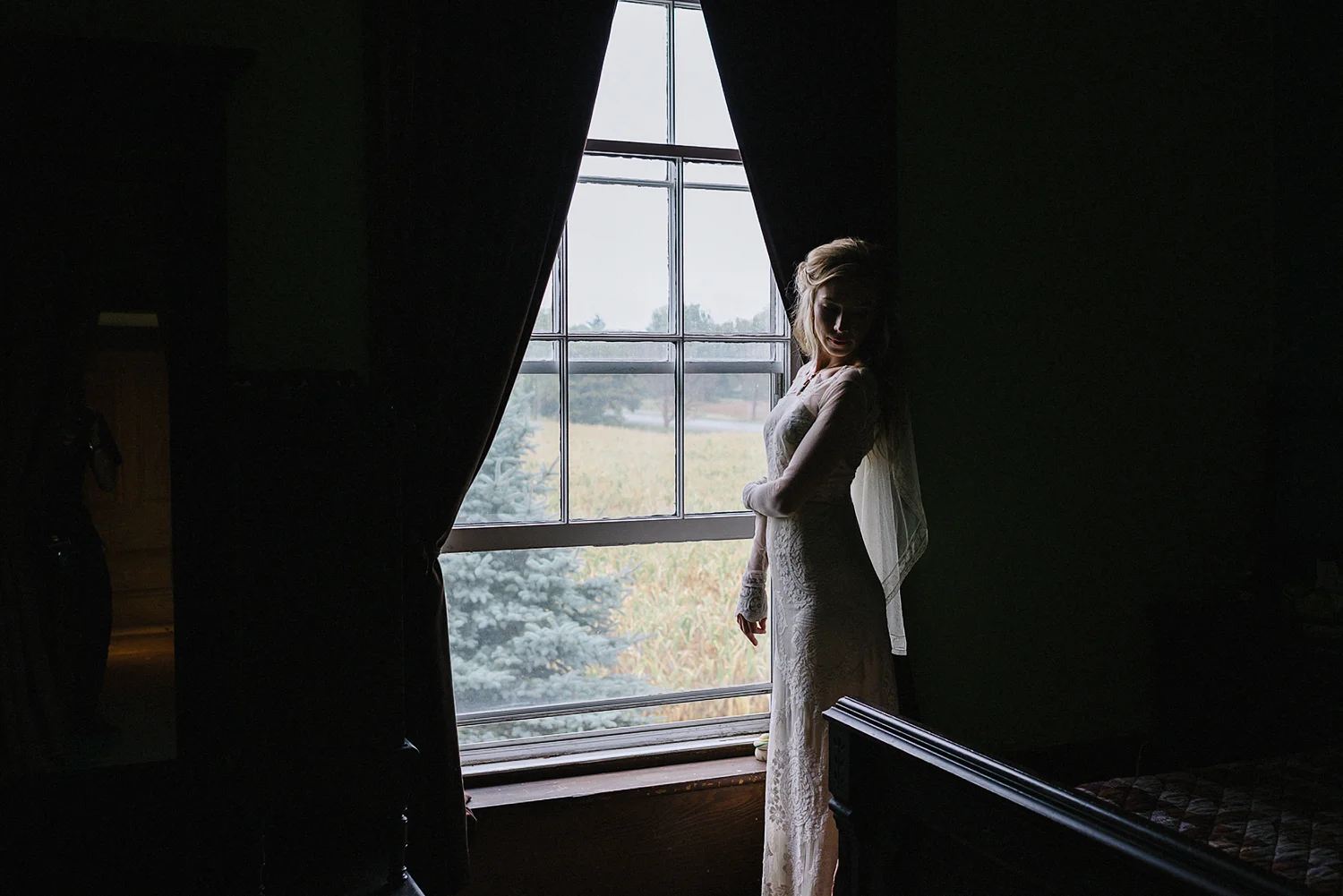 Best-Moody-Documentary-Wedding-Photography-Photojournalism-Vintage-Small-Town-Chapel-Wedding-Toronto-Ontario_Candid-Bride-in-vintage-room-me-in-mirror.jpg