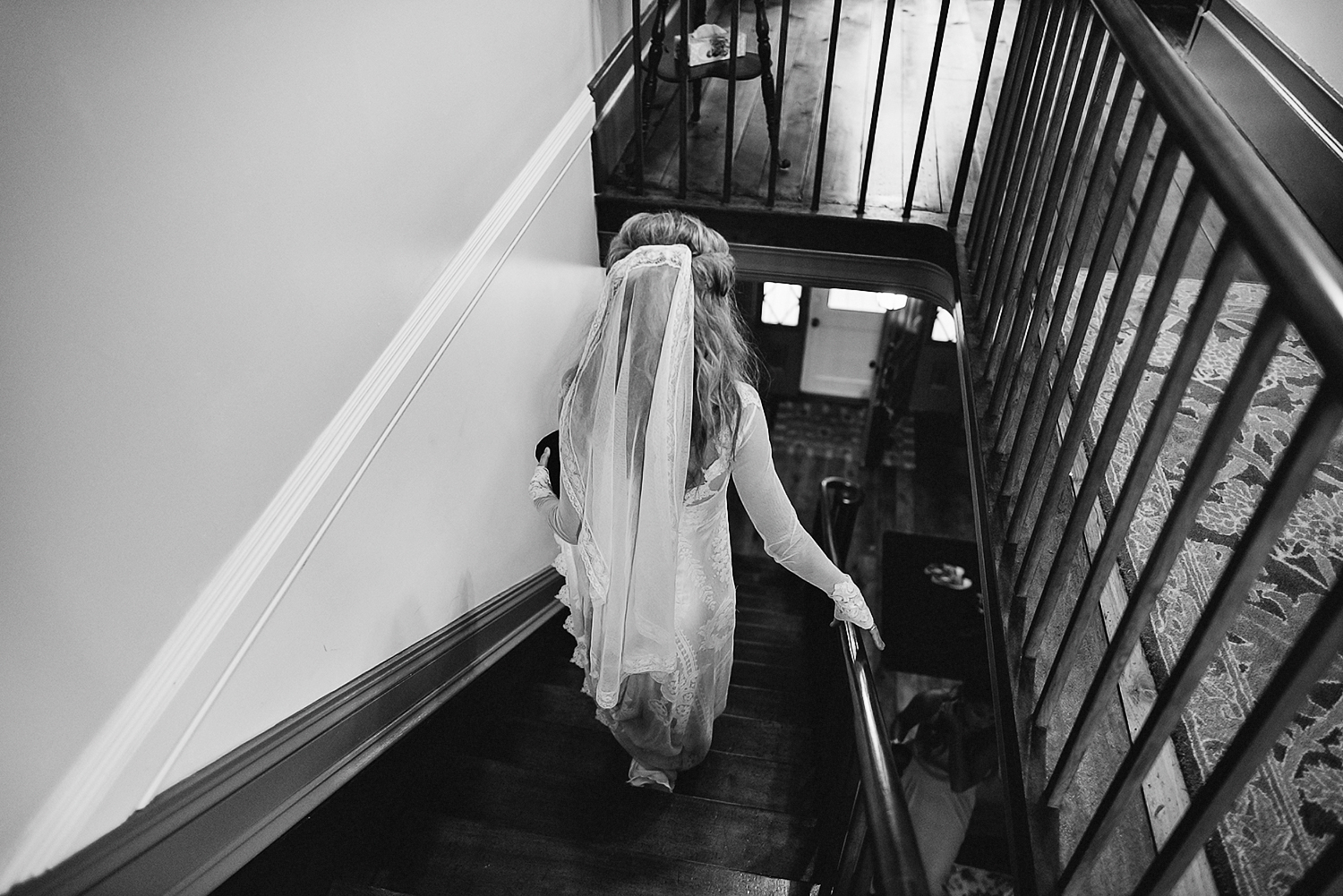 Best-Moody-Documentary-Wedding-Photography-Photojournalism-Vintage-Small-Town-Chapel-Wedding-Toronto-Ontario_Bride-exit-staircase-BW.jpg