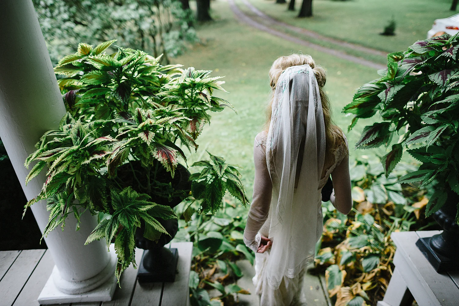Best-Moody-Documentary-Wedding-Photography-Photojournalism-Vintage-Small-Town-Chapel-Wedding-Toronto-Ontario_Bride-exit-into-garden.jpg