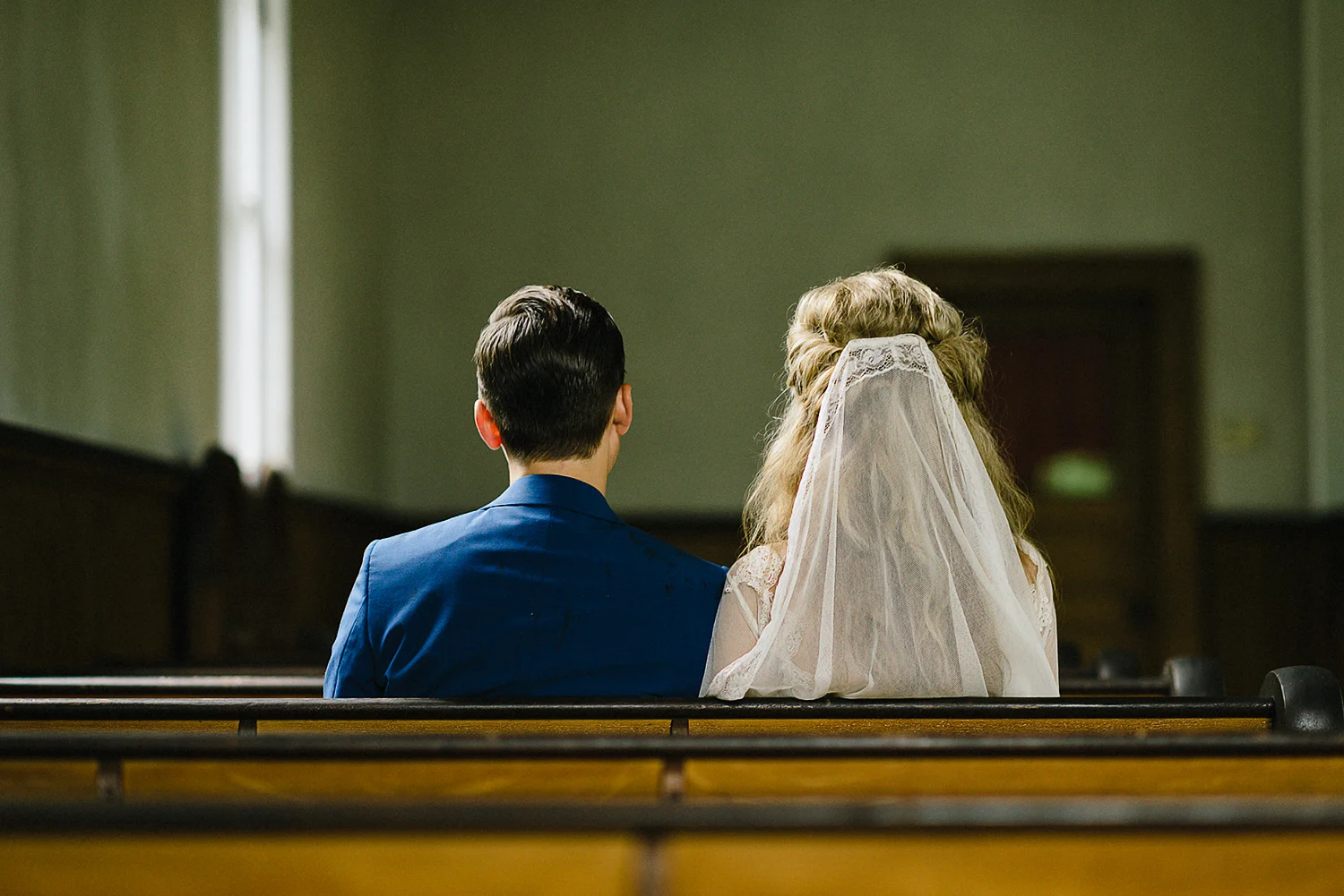 Best-Moody-Documentary-Wedding-Photography-Photojournalism-Vintage-Small-Town-Chapel-Wedding-Toronto-Ontario_Bridal-Portraits-Bride-and-Groom-inside-Chapel-candid.jpg