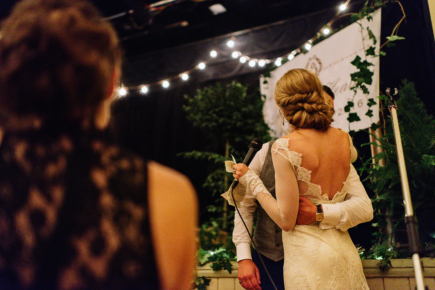 Best-Moody-Documentary-Wedding-Photography-Photojournalism-Vintage-Small-Town-Chapel-Wedding-Toronto-Ontario_Reception-Venue-Speech-from-Bride-hug-groom.jpg