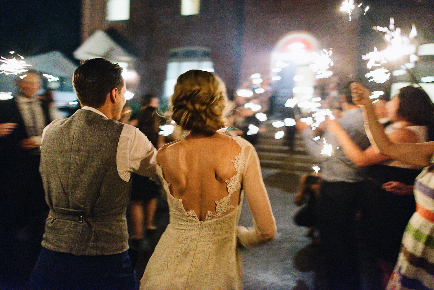 Best-Moody-Documentary-Wedding-Photography-Photojournalism-Vintage-Small-Town-Chapel-Wedding-Toronto-Ontario_Reception-Venue-bride-&-groom-sparkler-exit-run.jpg