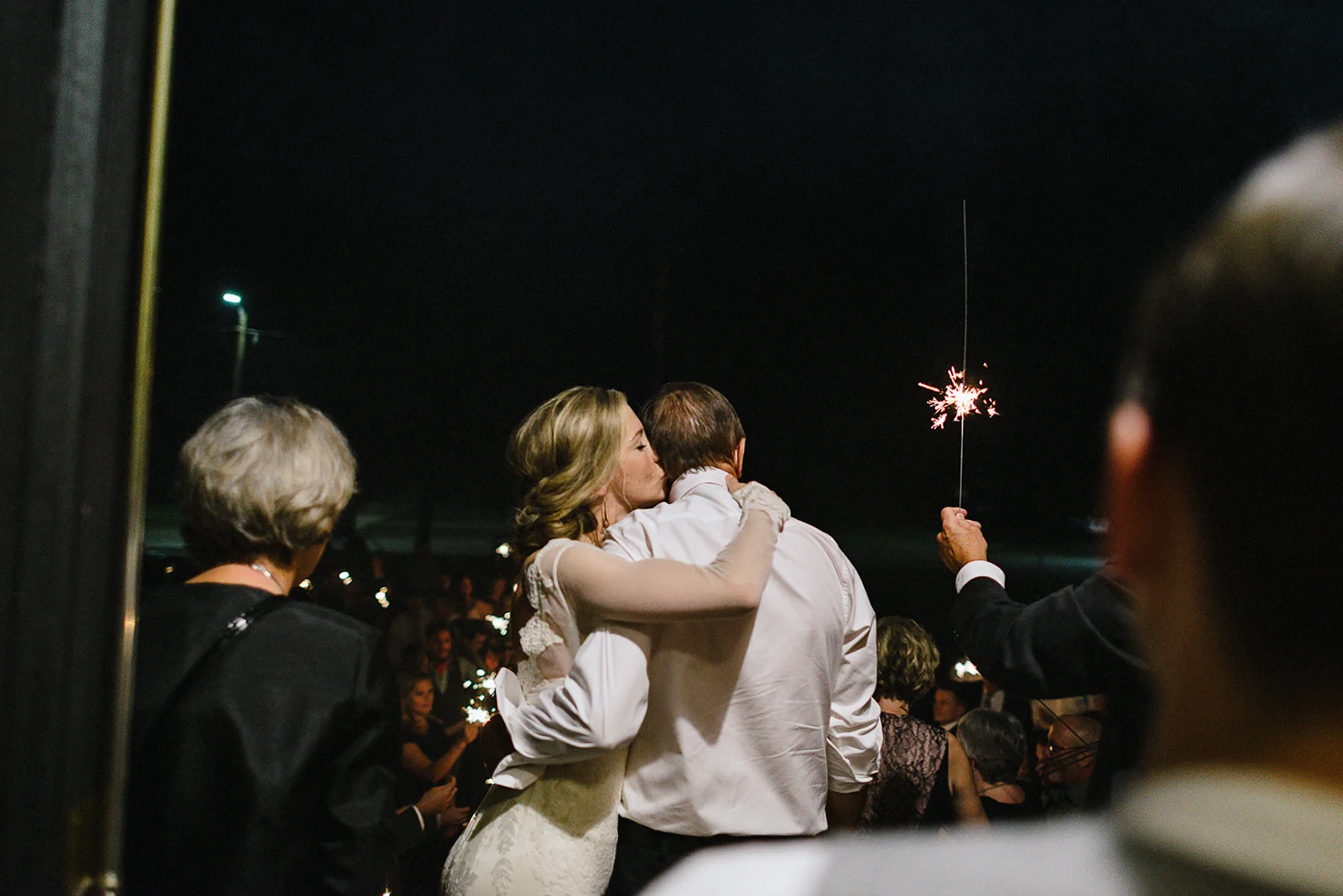 Best-Moody-Documentary-Wedding-Photography-Photojournalism-Vintage-Small-Town-Chapel-Wedding-Toronto-Ontario_Reception-Venue-bride-&-groom-sparkler-Exit-FOB.jpg