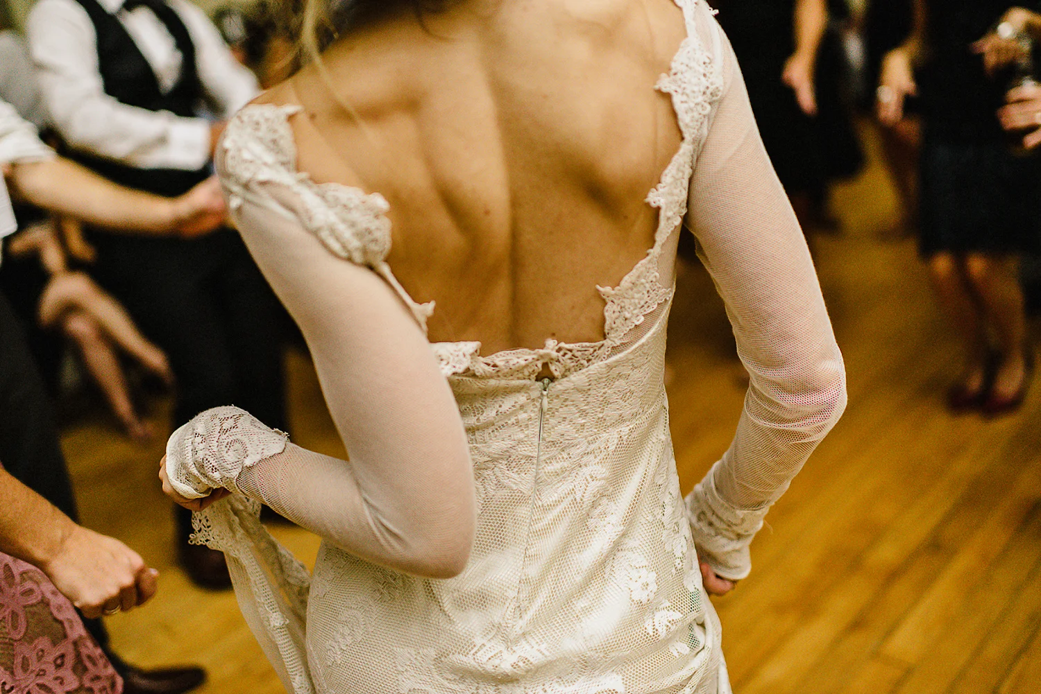 Best-Moody-Documentary-Wedding-Photography-Photojournalism-Vintage-Small-Town-Chapel-Wedding-Toronto-Ontario_Reception-Dance-Party-Bride-dancing-dress-details.jpg
