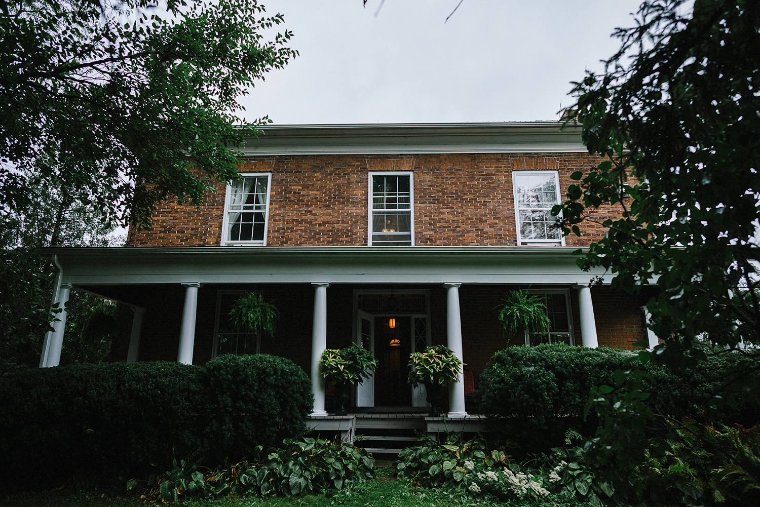 Best-Moody-Documentary-Wedding-Photography-Photojournalism-Vintage-Small-Town-Chapel-Wedding-Toronto-Ontario_Bed-and-Breakfast-Establishing-Shot.jpg