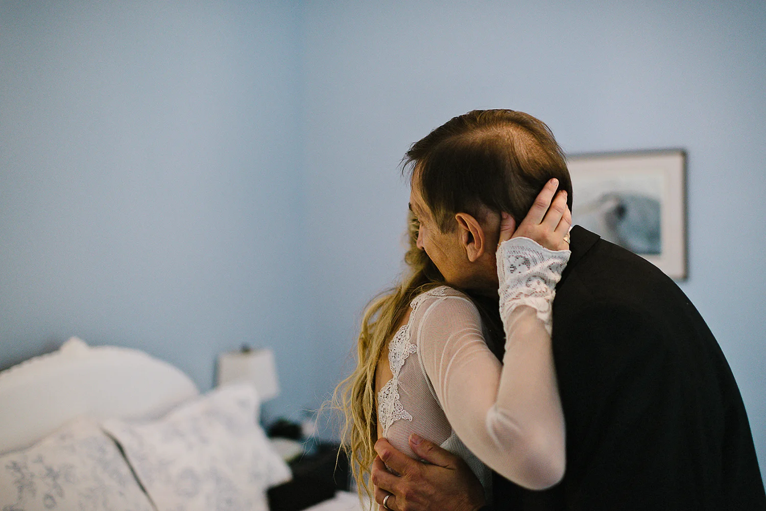 Best-Moody-Documentary-Wedding-Photography-Photojournalism-Vintage-Small-Town-Chapel-Wedding-Toronto-Ontario_Candid-Bride-Dad-Hugging.jpg
