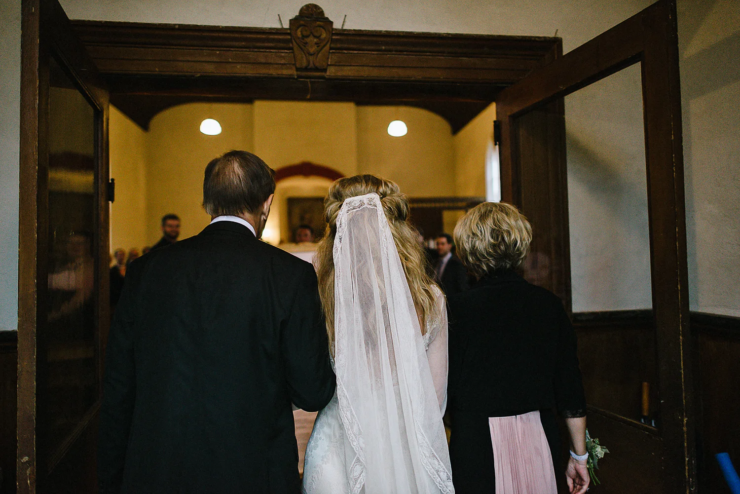Best-Moody-Documentary-Wedding-Photography-Photojournalism-Vintage-Small-Town-Chapel-Wedding-Toronto-Ontario_Ceremony-Entrace-Bride-and-parents.jpg
