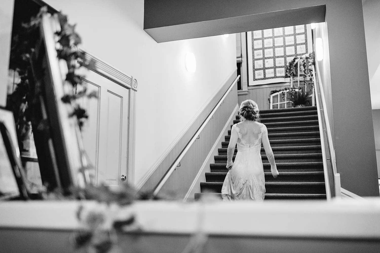 Best-Moody-Documentary-Wedding-Photography-Photojournalism-Vintage-Small-Town-Chapel-Wedding-Toronto-Ontario_Reception-Bride-Staircase.jpg