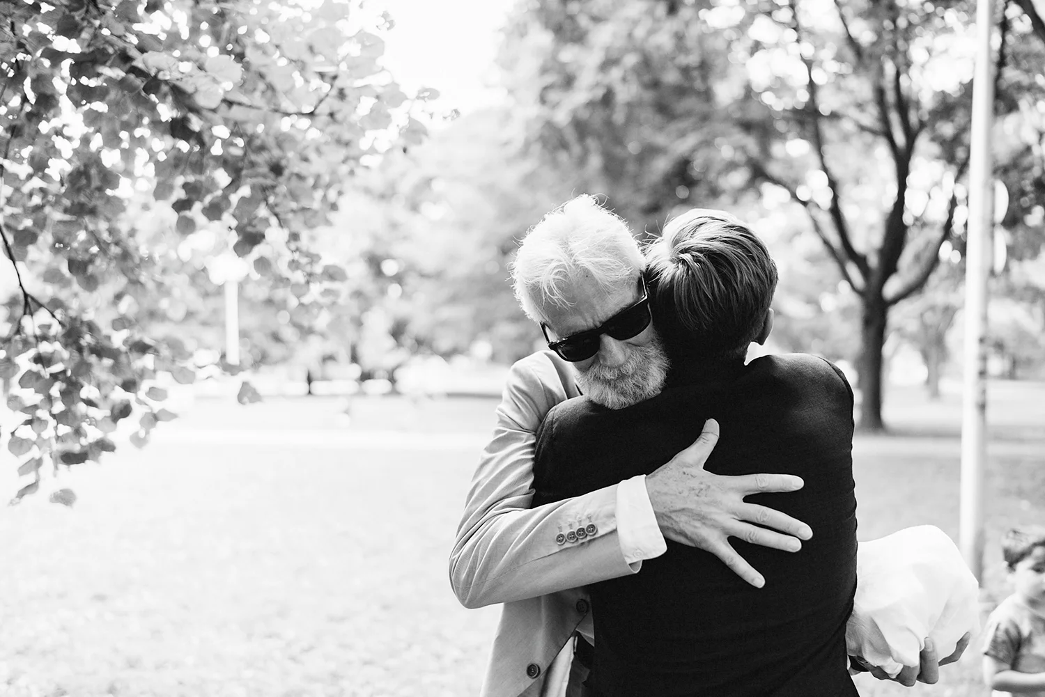 film-analog-photography-toronto-wedding-photographers-alternative-hipster-bride-and-groom-badass-ceremony-guests-watching-bride-and-groom-vows-film-kodak-portra-800-first-kiss-just-married-celebration-hugging-dad.jpg
