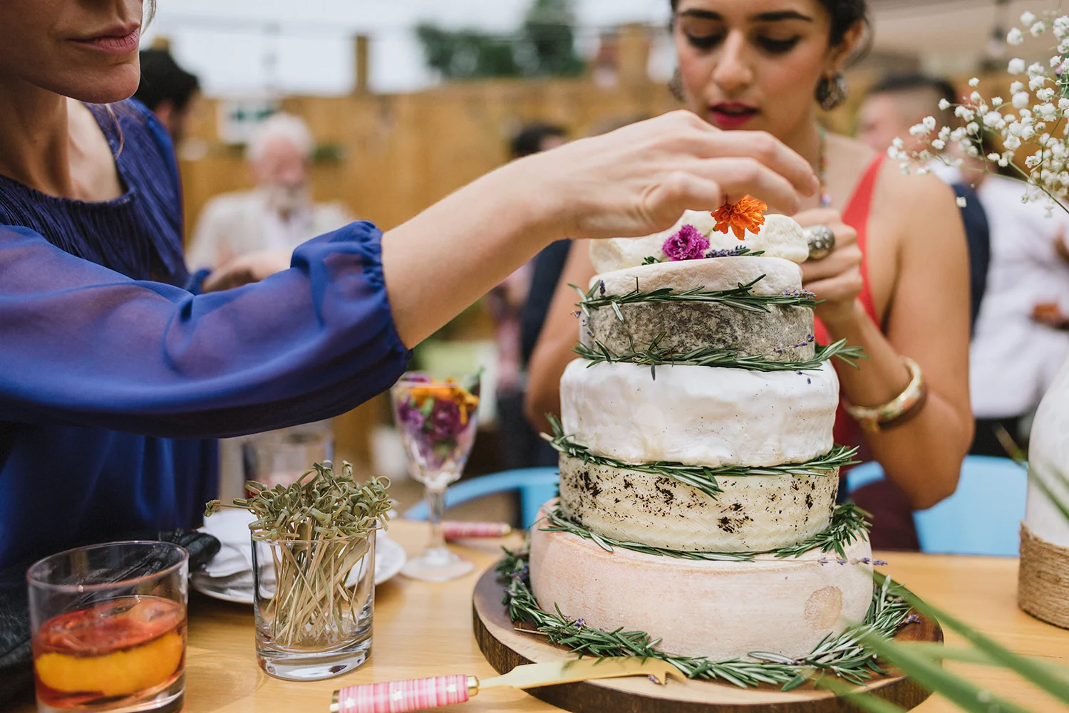 film-analog-photography-toronto-film-wedding-photographers-alternative-reception-bar-pray-tell-cocktail-hour-details-fancy-cheese-cake-made-of-cheese-fixing-it-up.jpg