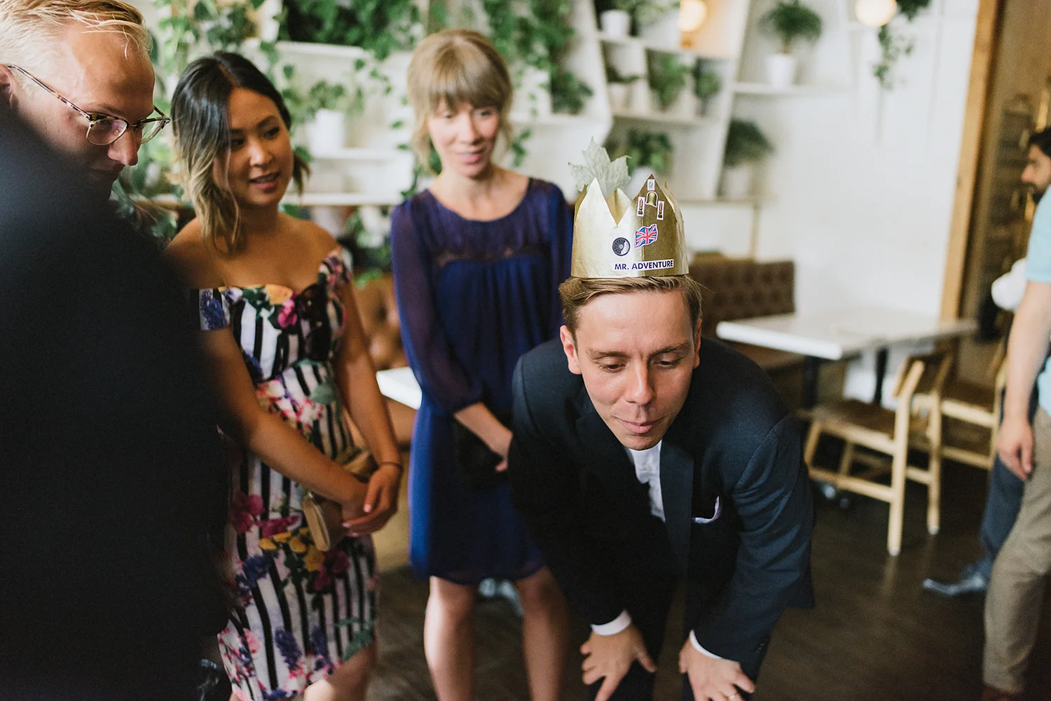 film-analog-photography-toronto-wedding-photographers-alternative-reception-bar-pray-tell-cocktail-hour-groom-crown-hilarious.jpg