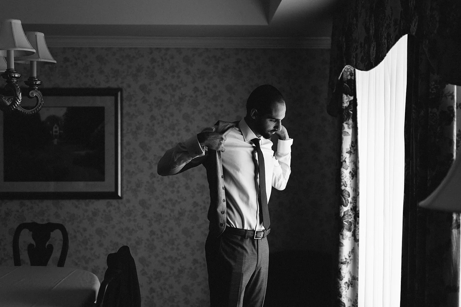Toronto's-Best-Film-Wedding-Photography-3B-Photography-Brian-Batista-Bettencourt-Multicultural-wedding-day-two-Hamilton-Grimsby-Toronto-Wedding-Getting-Ready-Groom-getting-dressed-pouring-drinks-candid-documenting.jpg