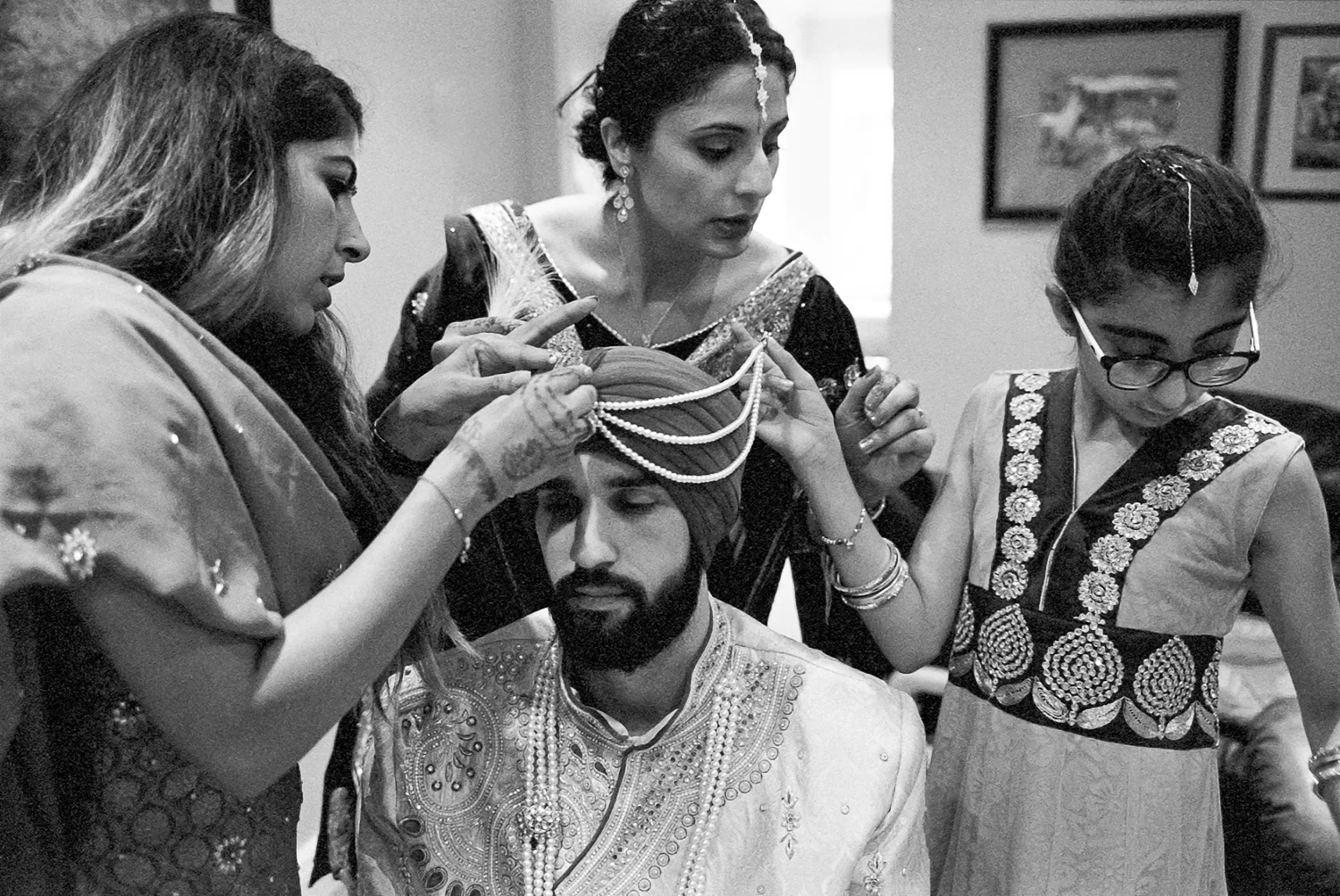 Best-Analog-Film-Wedding-Photographers-in-Toronto-3B-Photography-Brian-B-Bettencourt-Leica-M4P-Kodak-Film-Portra-400-Groom-Getting-ready-putting-on-traditional-turban-with-help-from-family.jpg