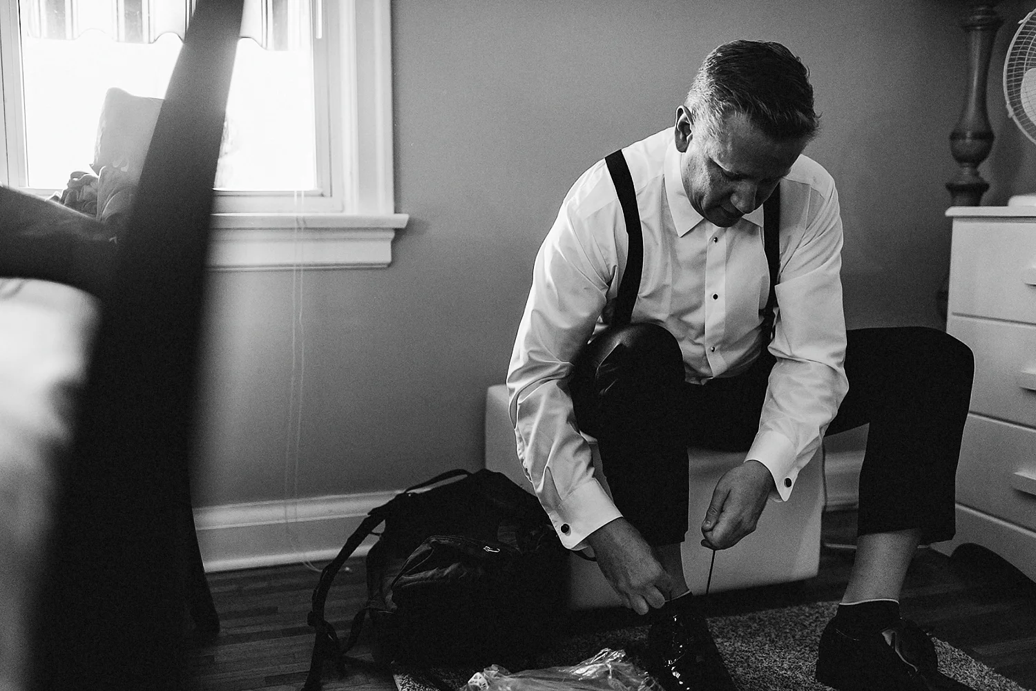Toronto-Wedding-Photographers-with-natural-photojournalistic-documentary-style-3b-photo-Niagara-on-the-Lake-Wedding-Getting-REady-in-Port-Dalhousie-Groom-shoes.jpg