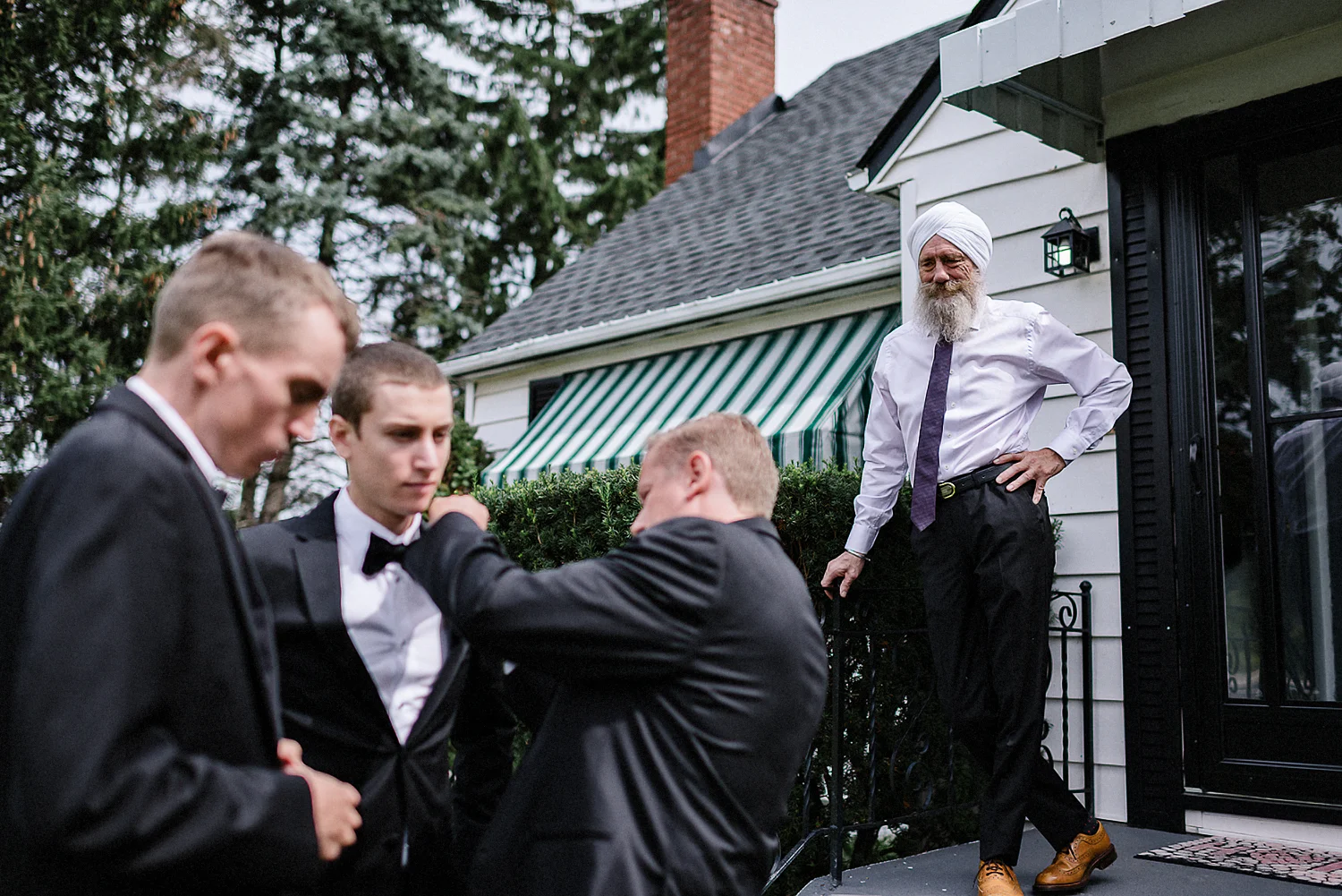 Toronto-Wedding-Photographers-with-natural-photojournalistic-documentary-style-3b-photo-Niagara-on-the-Lake-Wedding-Getting-REady-in-Port-Dalhousie-Granpa-candid.jpg