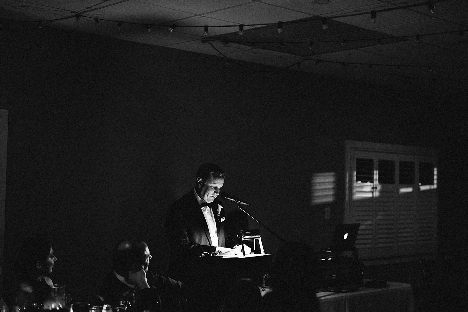 film-analog-photography-toronto-film-wedding-photographers-alternative-reception-bar-pray-tell-cocktail-hour-reception-on-the-patio-casual-bride-and-groom-hugging-guests-smiling-happy-celebrating-family-brother.jpg