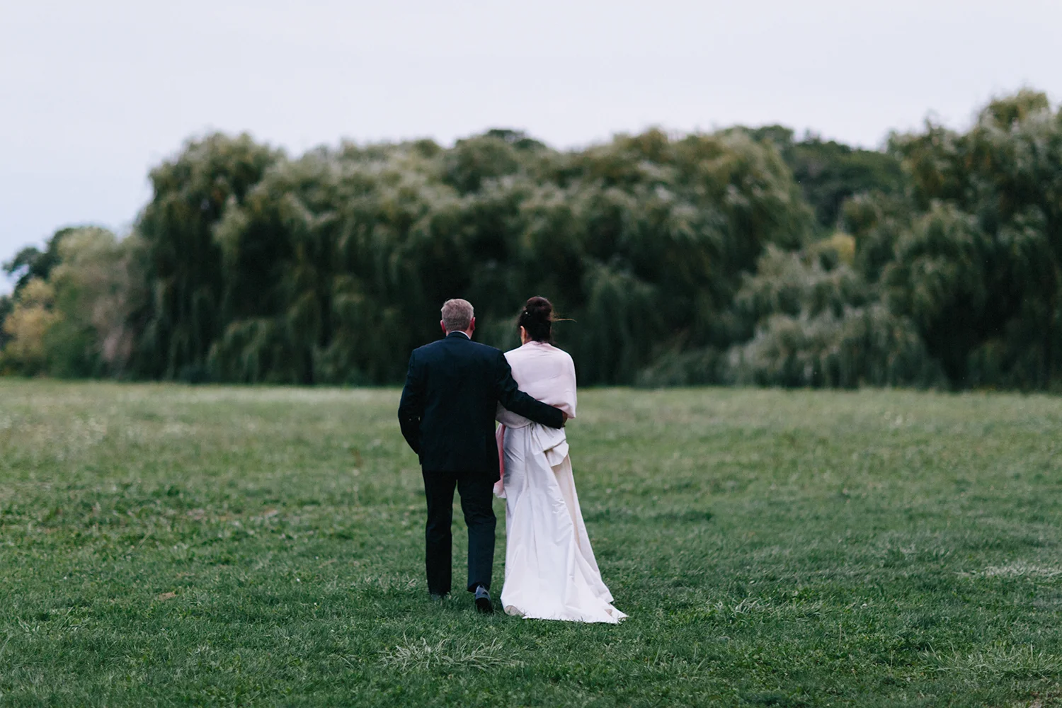 Best-Wedding-Photographers-in-Niagara-on-the-Lake-Toronto-Port-Dalhousie-curling-club-venue-inspiration-photojournalistic-documentary-style-candid-real-couples-portraits-walking-in-wilderness-and-willow-trees-EPIC.jpg