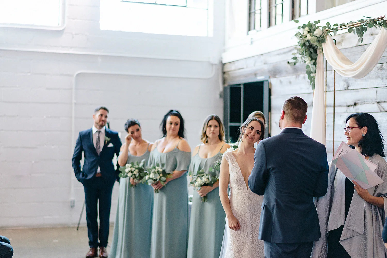 Best-Wedding-photographers-Toronto-NAtural-Candid-wedding-photography-Airship37-Wedding-Ceremony-Entrance-Candid-Moment-Bride-emotional-vows.jpg