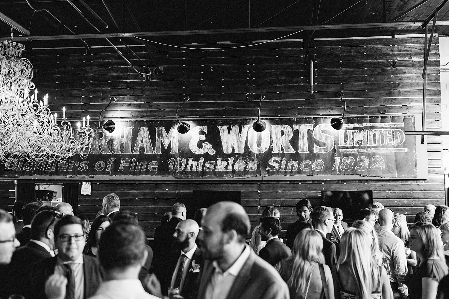 Best-Wedding-photographers-Toronto-NAtural-Candid-wedding-photography-Airship37-Wedding-Cocktail-Hour-Guests-Inside-Signs.jpg