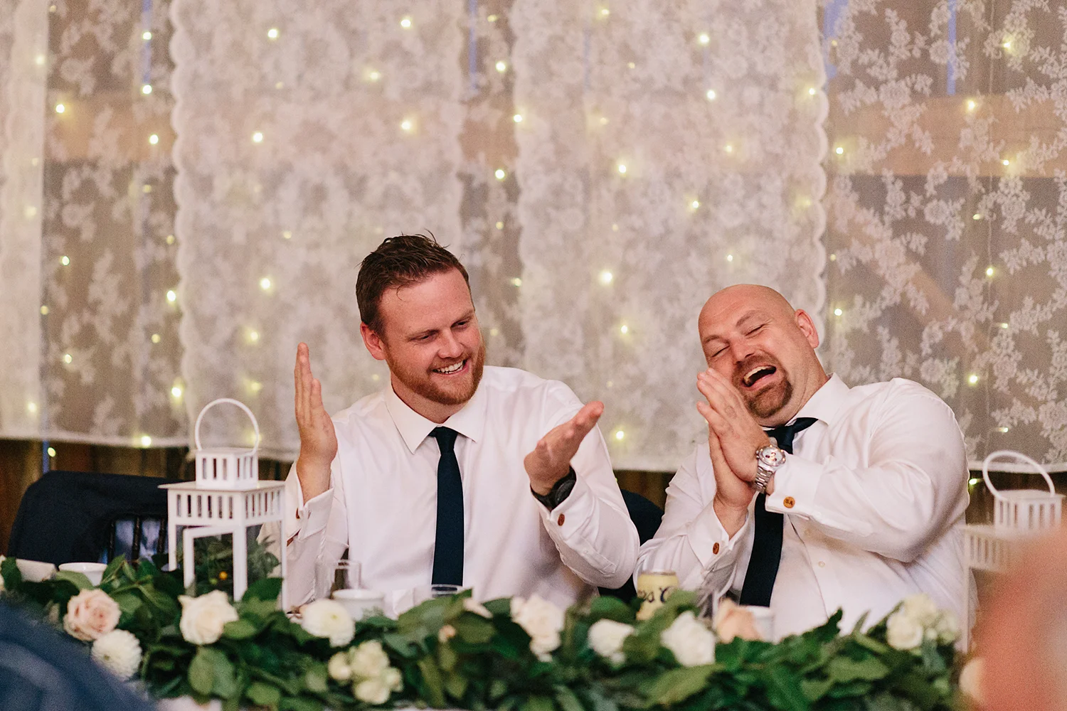 Documentary-Wedding-Photographers-in-Toronto-Candid-Natural-Dowswell-Barn-Wedding-Rustic-GTA-Muskoka-Farm-romantic-barn-golden-light-speeches-groomsman-guests-cheering-clapping-laughing.jpg