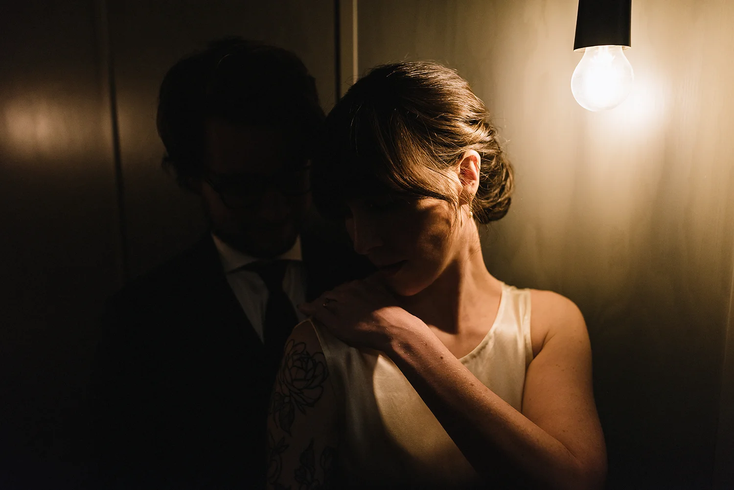 portraits-of-groom-and-bride-by-light-moody-editorial-Toronto-Elopement-at-the-Drake-Hotel-pop-up-Torontos-Best-wedding-photographers-candid-documentary-photojournalistic.jpg